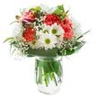 This bright, elegantly balanced bouquet brings together the essence of New Southgate's welcoming community and the freshness of an early spring morning. Fluffy coral-pink carnations, their ruffled petals abundant and sculptural, form the energetic heart of the arrangement. Around them, crisp white chrysanthemums and dainty white daisies interlace, their vivid green-gold centres shining like little orbs of hope beneath the even light. Amid these, feathery sprigs of baby's breath weave in and out, providing an ethereal softness reminiscent of a cloud-strewn sky over Brunswick Park. On the edges, a few tightly closed alstroemeria buds in shades of magenta and purple offer the promise of tomorrow, deepening the bouquet's tonal richness. The whole ensemble is wrapped in robust, glossy green leaves, both grounding and enhancing the colours above, while slender foliage adds a touch of wild meadow freedom. Presented in a transparent glass vase filled with sparkling water, every stem is clearly visible, radiating a sense of purity and vitality. Meticulously crafted for occasions of celebration, encouragement, or thanks, this bouquet would enliven any kitchen table or hallway along Station Road, spreading happiness and a gentle sense of renewal throughout the local New Southgate area.